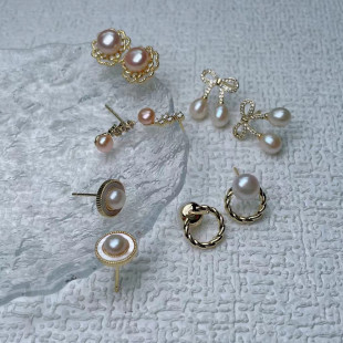 Simple bow freshwater pearl 925 silver needle earrings female temperament Joker ear jewelry stall wholesale supply