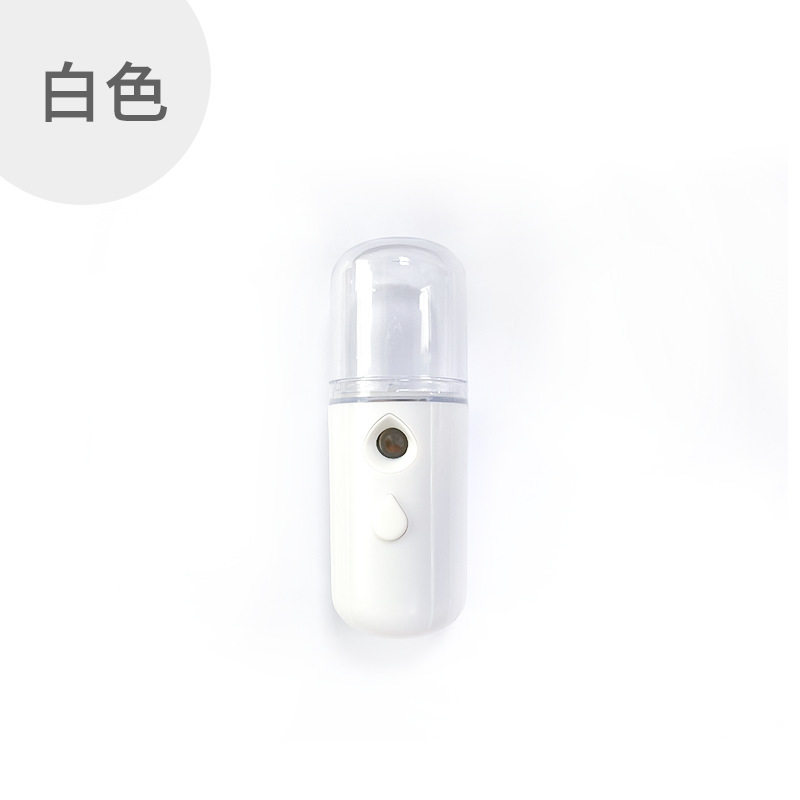 ナノスプレー補水器ポータブル顔加湿器はミニ充電美容器を持っています。|undefined