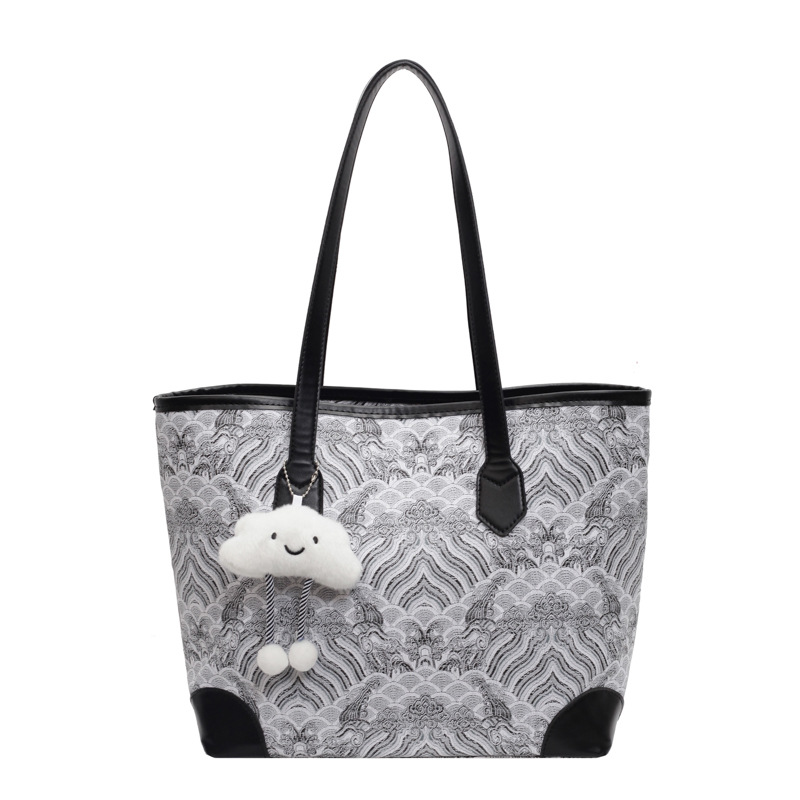 Nueva bolsa de hombro de gran capacidad de estilo chino para mujeres 2024 otoño nuevo estilo de alta calidad de impresión de patrón de montaña y mar bolsa especial
