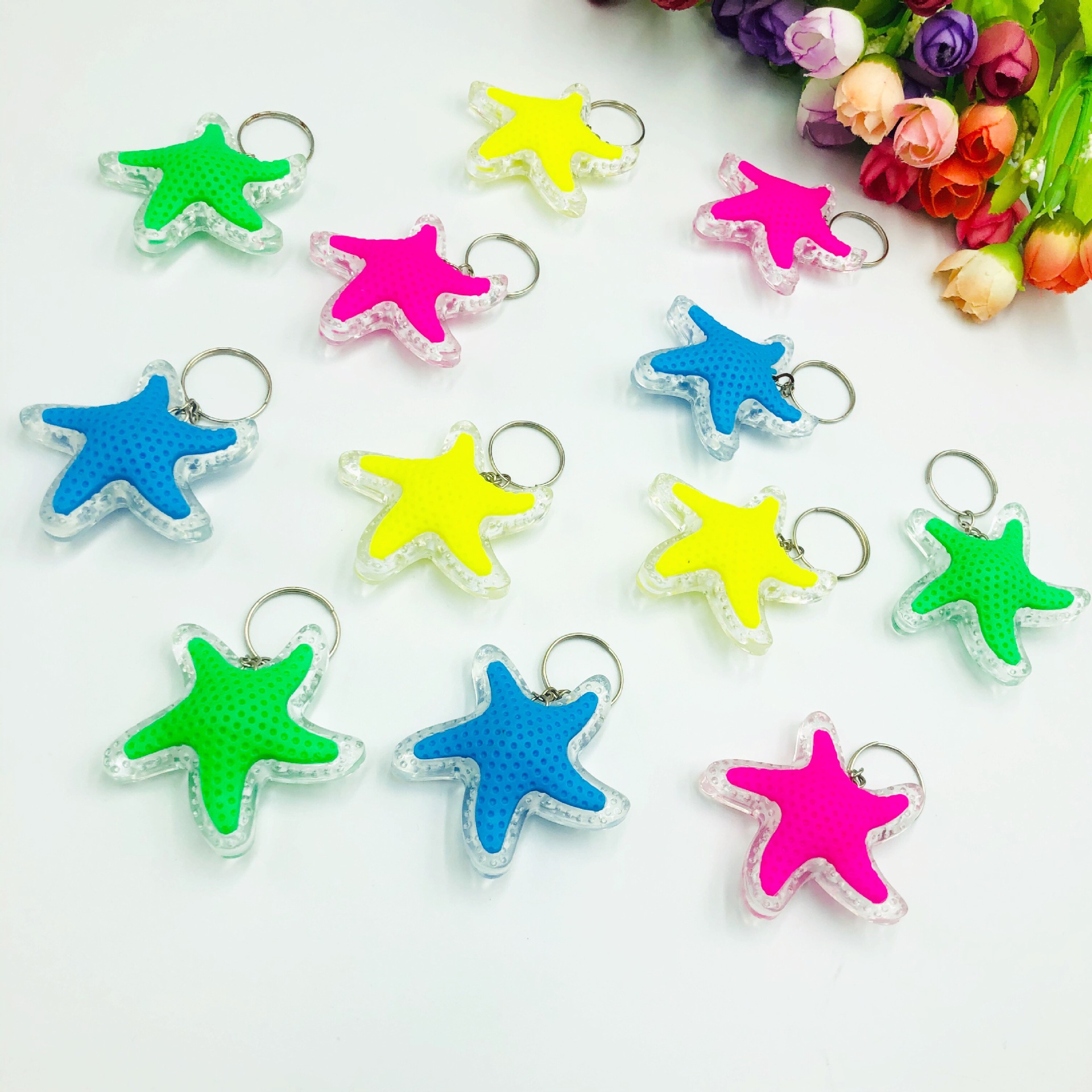 Simulación luminosa estrella de mar llavero colgante creativo llavero luz de color pequeño regalo luminoso juguete transfronterizo