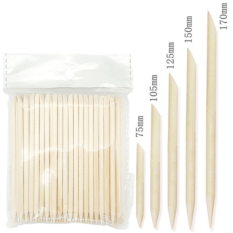 Usar un palo de uñas, un palo de naranja de doble cabeza, un palo de beech, empujar la piel muerta, relieve, pegamento, accesorios de eliminación de uñas para limpiar las juntas de uñas.