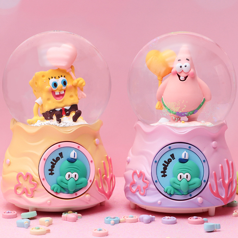 Animado encantador con la misma caja de música de bola de cristal de Bob Esponja resina creativa brillante nieve flotante caja de sonido boutique