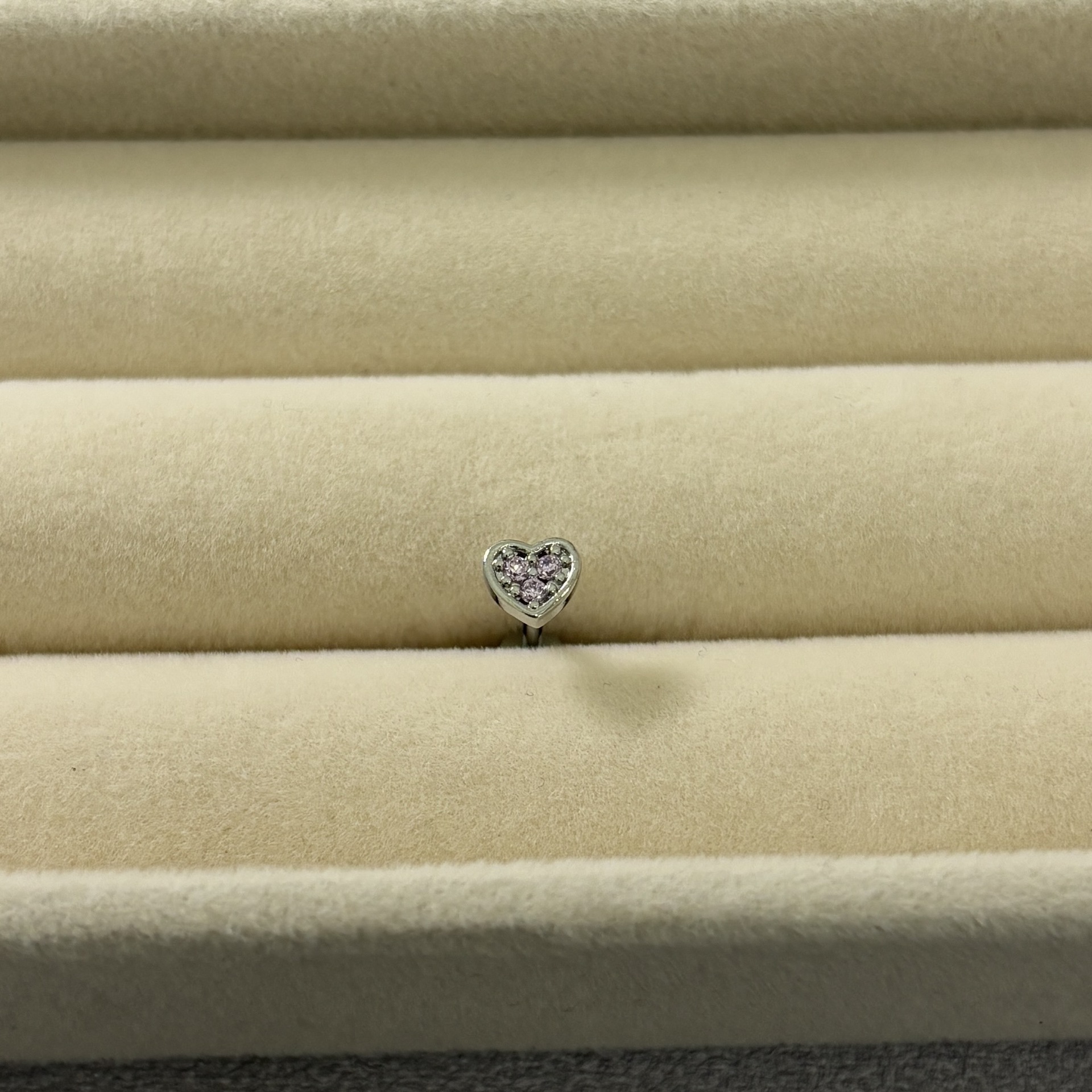 Silver pointed spike labret stud material detail