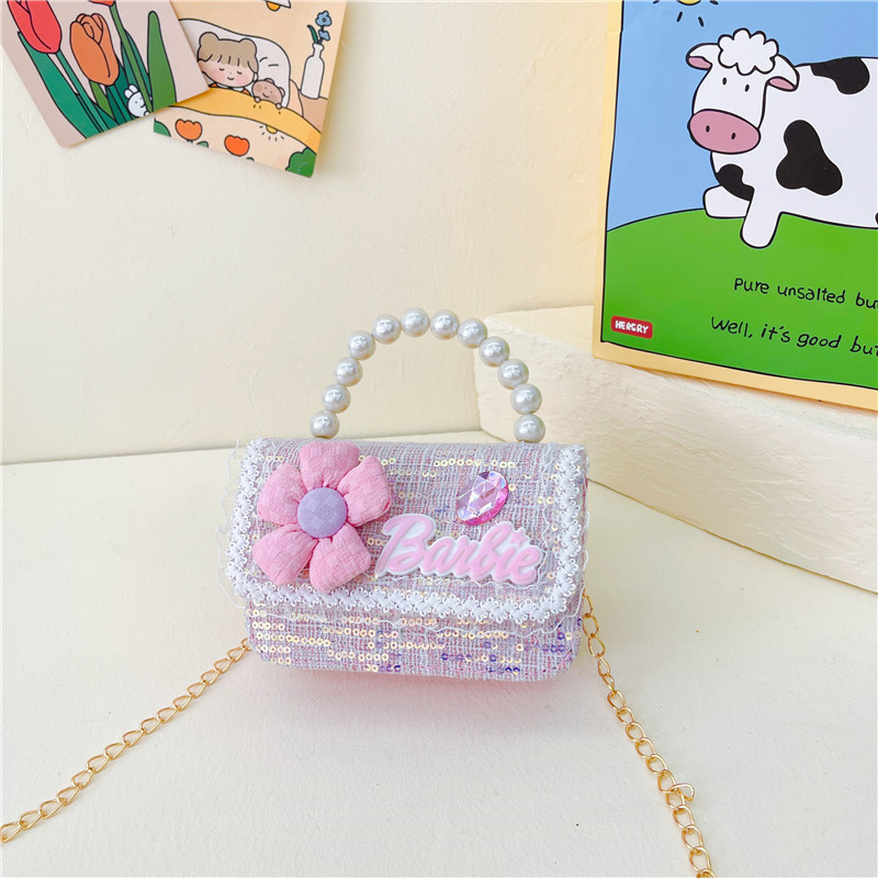 Bolso de los nuevos niños al por mayor bolso de princesa Linda pequeña flor arco accesorios bolsa versátil bolsa de mensajero de las muchachas