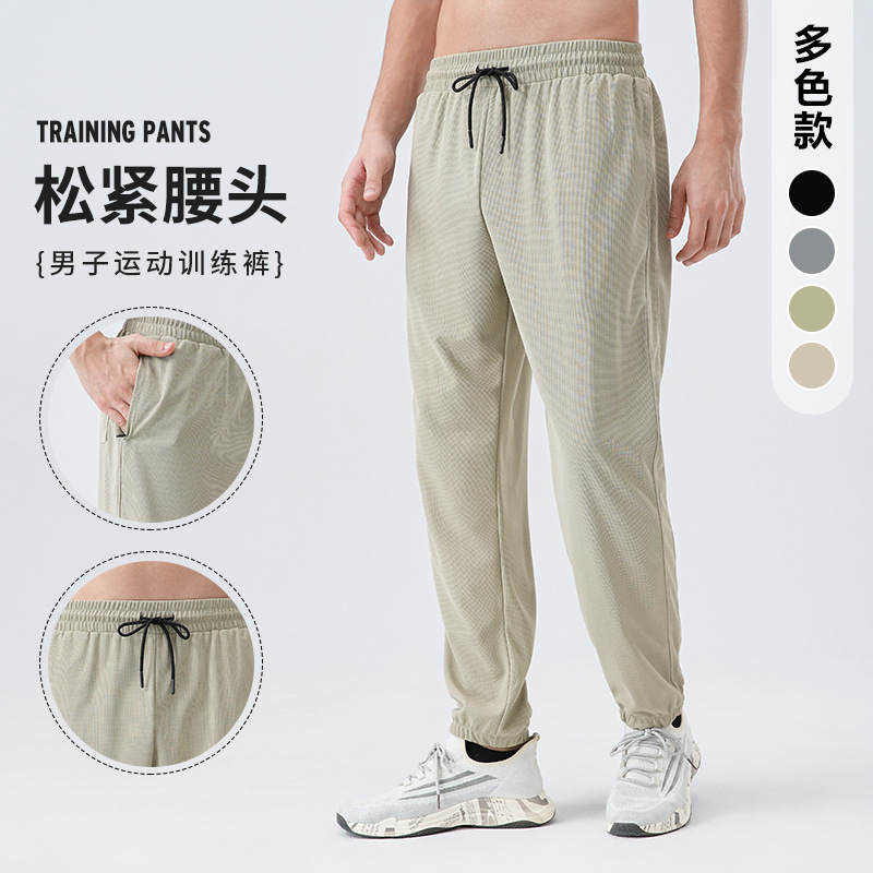 Pantalones deportivos de tejido para hombres respirantes absorbientes de humedad secado rápido entrenamiento de maratón de atletismo para correr pantalones casuales