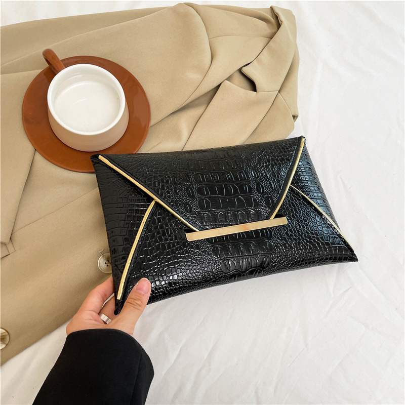 Nicho de diseño de alta textura bolsos mujeres 2024 bolsos de mano de diseño de cocodrilo estilo de moda bolsos de mano
