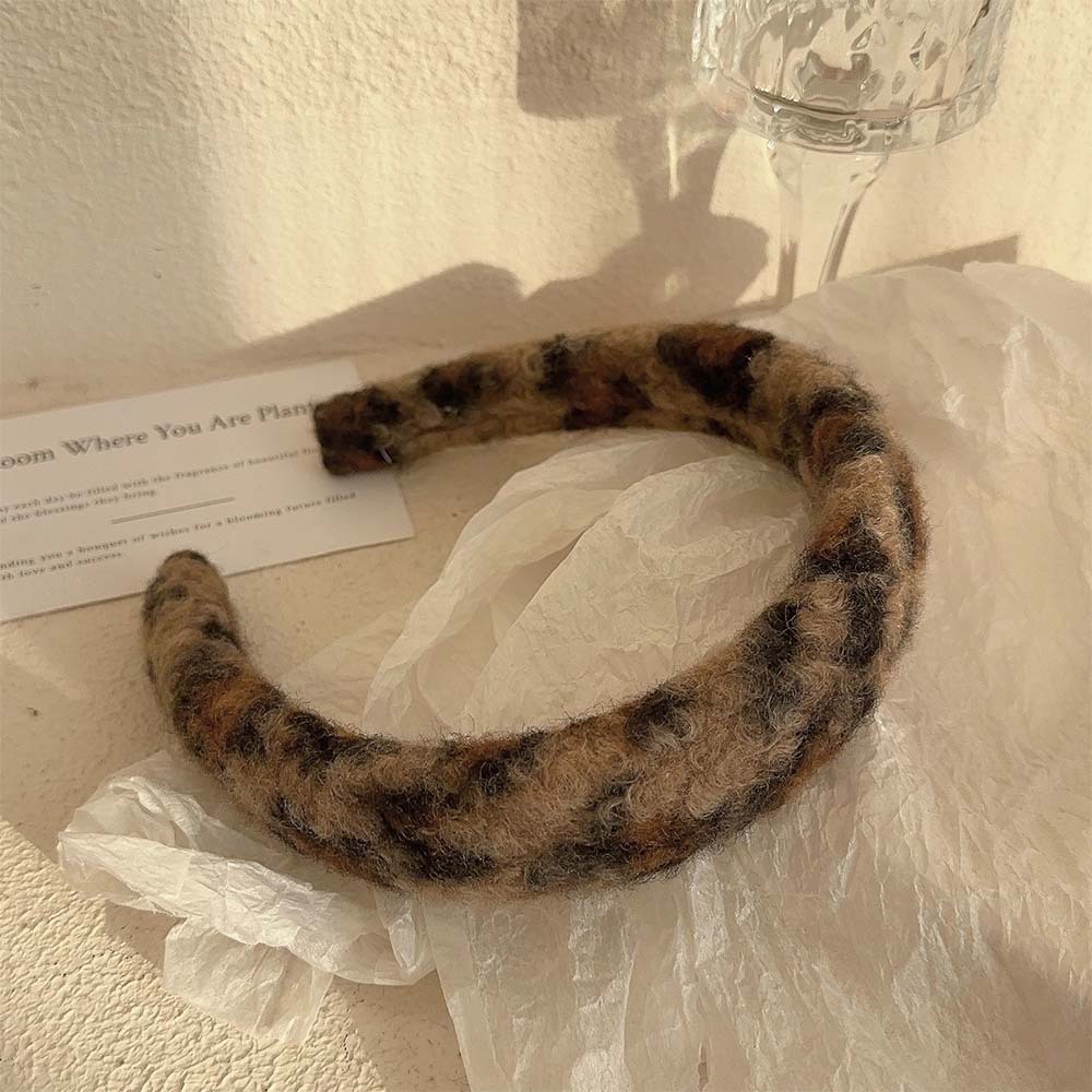 Otoño y invierno de alta calidad cordero estampado leopardo nuevo estilo de moda cabeza de cabeza de alto cinturón de peluche universal fuera de la tarjeta de pelo
