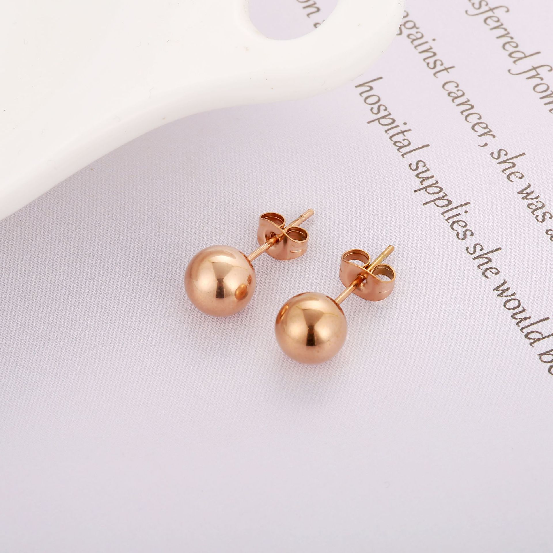 European And American Elegant Clover Smiley Face Round Beads Titanium Steel Ear Studs Suit Women's Simple Fashion Ins Earrings Rose Gold display picture 3