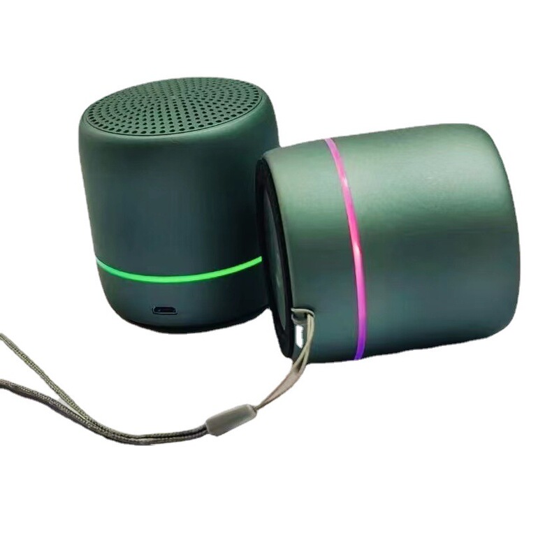 New macaron Bluetooth speaker mini creative small stereo compact portable round small steel gun wholesale