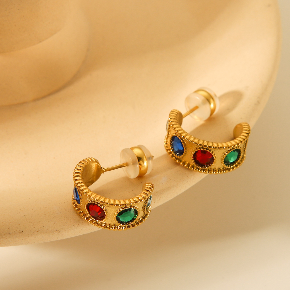 Transfronterizos Europa y América 18K oro C tipo de acero inoxidable titanio pendientes de piedra de diseño ligero lujoso temperamento retro pendientes de acero de titanio para mujeres