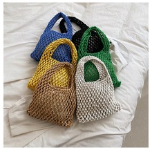 批发新款女士手提包韩系ins时尚洋气镂空手腕包手工编织女包韩版