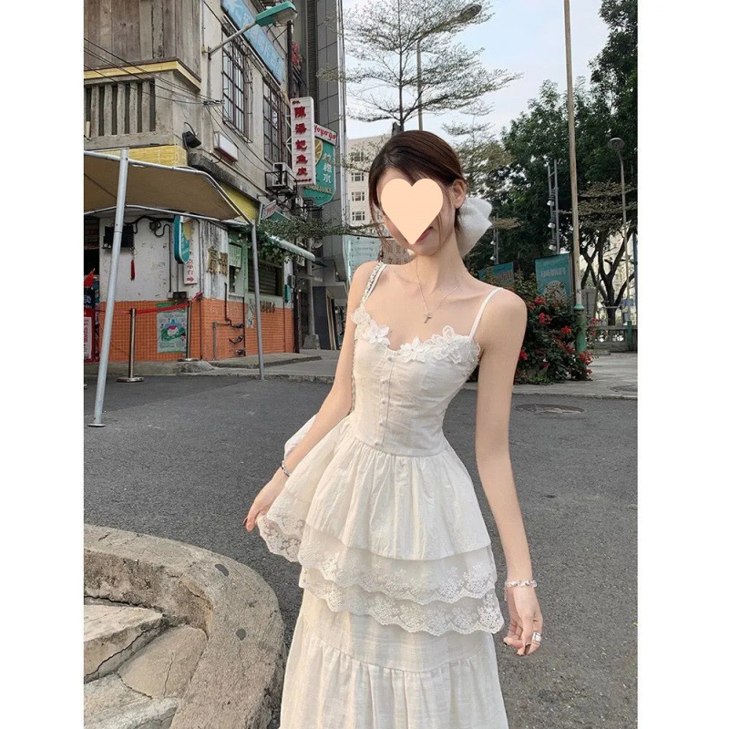 Two-Piece Set for Women: Stylish White Spaghetti Strap Dress Layered with a New Style Long Skirt Two-Piece Set for Women: Stylish White Spaghetti Strap Dress Layered with a New Style Long Skirt