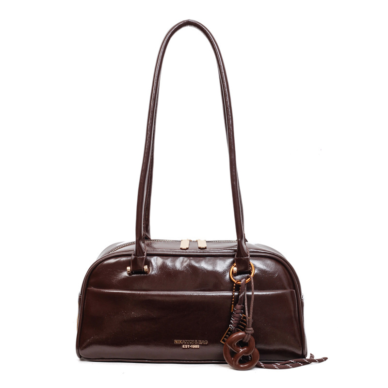 Bolsa de almohada retro para mujeres invierno 2025 nueva alta sensación de cuero suave bolsa de hombro bajo la axila bolsa de bolos de mano de moda
