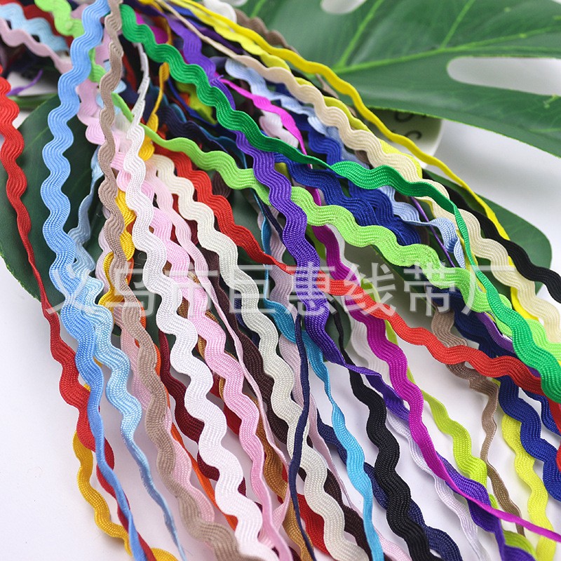 Fábrica al por mayor 5mm cinturón de onda de color en forma de S cinturón lateral curvo cinturón de marinero ropa textil para el hogar cinta de encaje decorativo