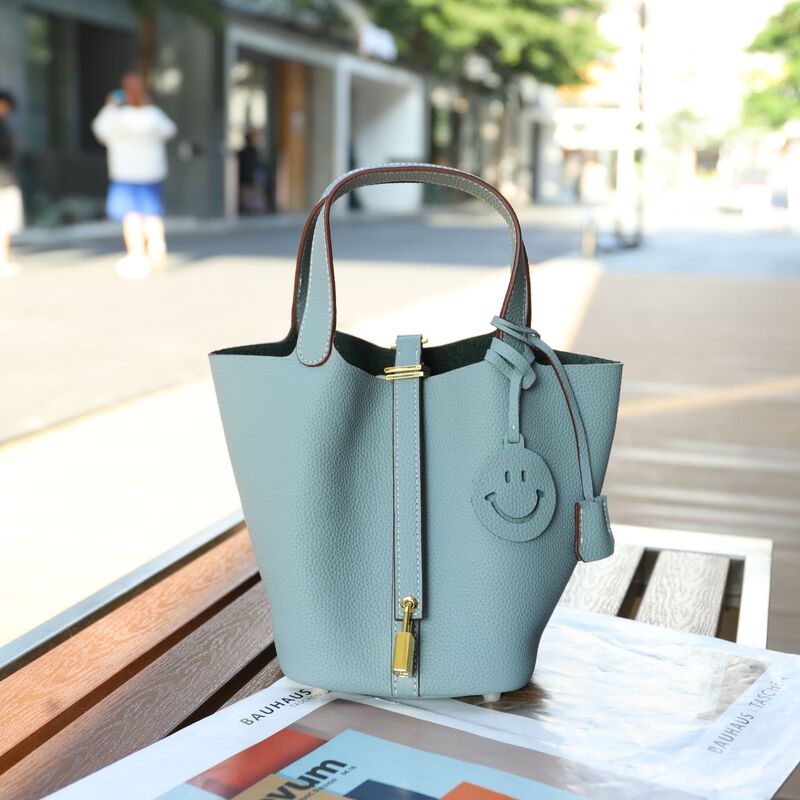 2025 New Style Cowhide Vegetable Basket Women's Bag Genuine Leather Bucket Bag Handheld Shoulder Bag Litchi Pattern Bucket Bag
