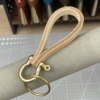 Original color cowhide + brass hardware