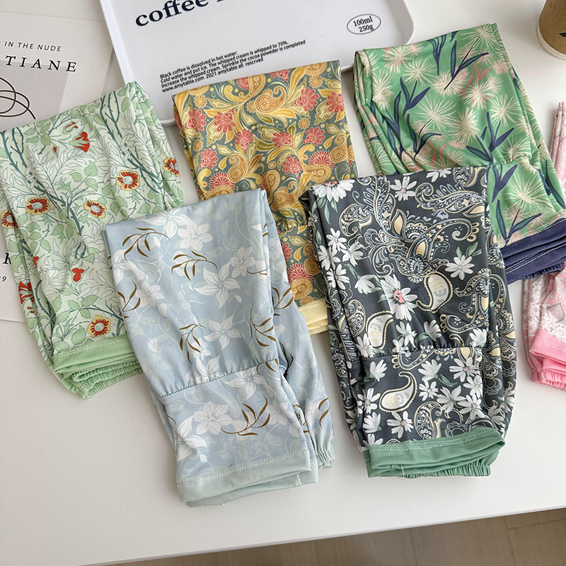 Mangas de protección solar para mujeres de verano nuevo estilo al aire libre anti-UV patrón de montar mangas de brazo de impresión de viento elegante