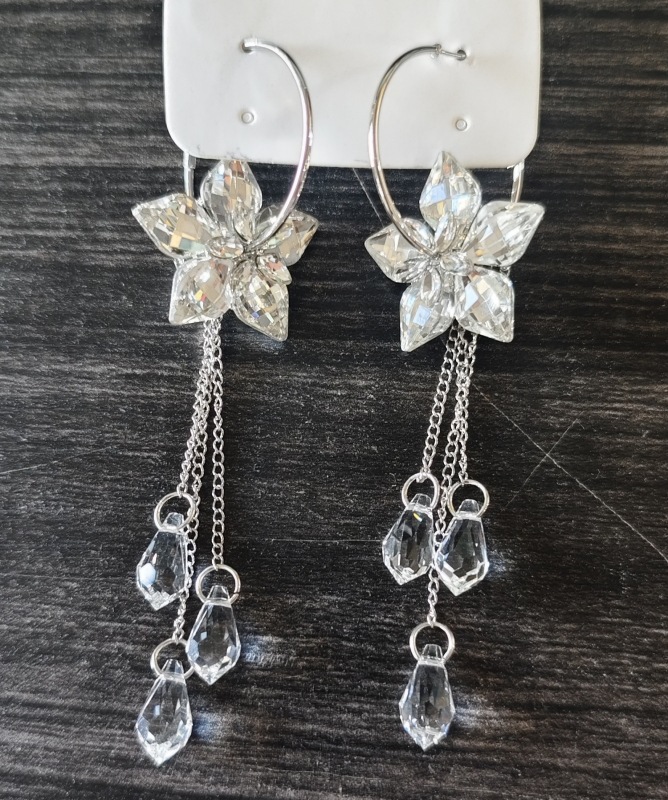 Pendientes de flor de lazo elegante de súper hada de plata Pendientes de moda de lujo ligero francés Pendientes de todo fósforo dulce de estilo literario