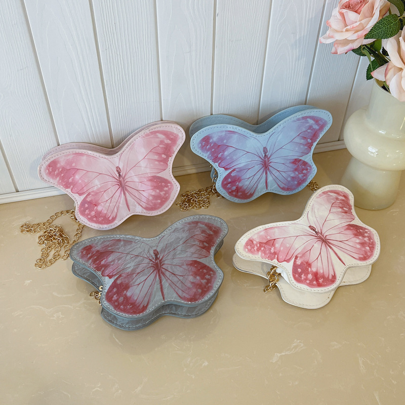 Dolce y lindo pequeña mariposa niña bolsa de hombro exquisita mini bolsa de cadena de bebé bolsa de cambio de comercio exterior transfronterizo para niños