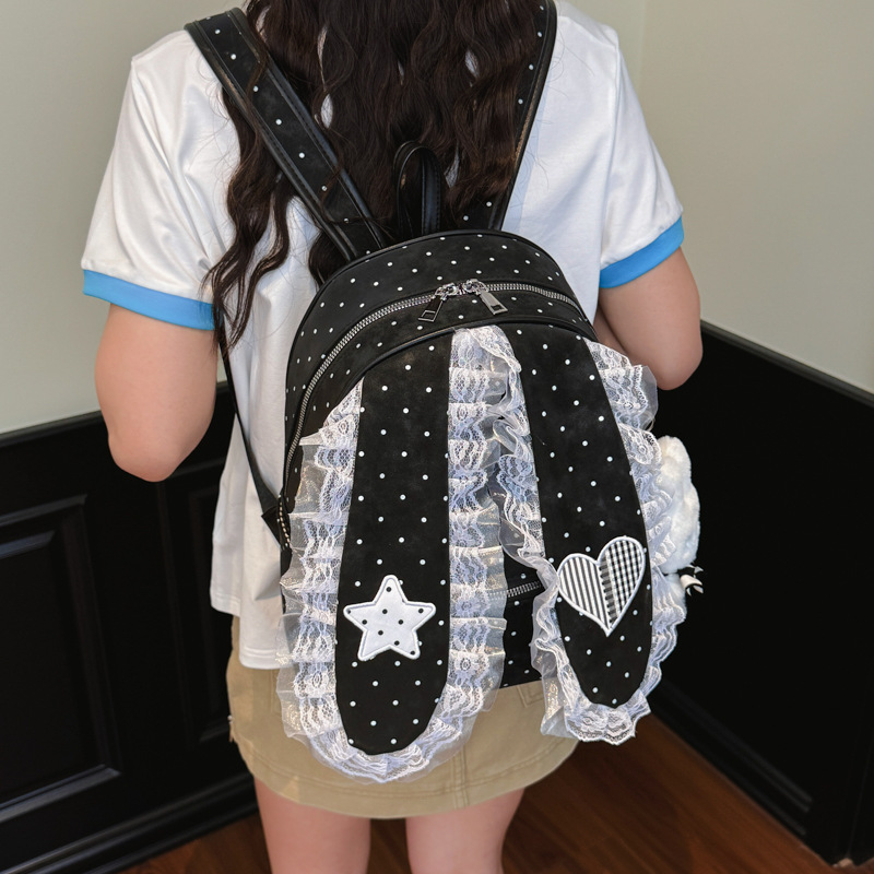 2026 nuevo punto de onda oreja de conejo mochila de moda mujer bolso de hombro universal portátil ligero bolso de encaje dulce