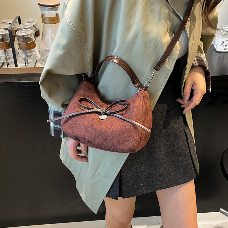 韩版蝴蝶结手拎饺子包女2025秋季新款潮流洋气褶皱休闲单肩斜挎包|undefined