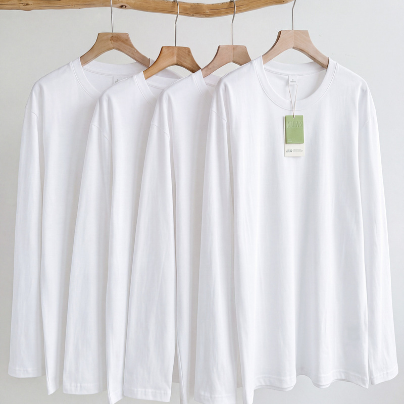 50 pieces of women's white long-sleeved T-shirts made of mercerized cotton, 2026 autumn collection, pure cotton base layer, round neck, white inner top, also available for men 50 pieces of women's white long-sleeved T-shirts made of mercerized cotton, 2026 autumn collection, pure cotton base layer, round neck, white inner top, also available for men