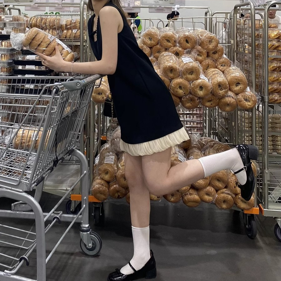 フレンチヘボン風チョッキワンピース女性夏新作ゆったり着痩せ裾柔糸ノースリーブa字小黒スカート