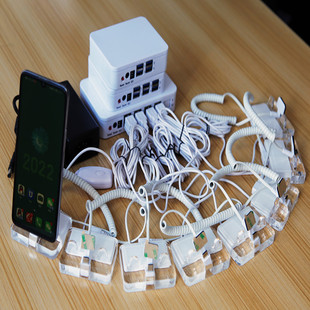 Multi-channel mobile phone anti-theft alarm one-to-four vertical charging wire pulling anti-theft device store counter experience display stand