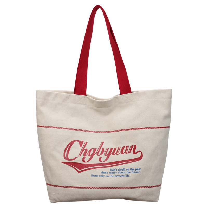 Bolsa de lona para mujeres 2026 nueva bolsa de hombro portátil simple y versátil bolsa de viaje de clase diaria