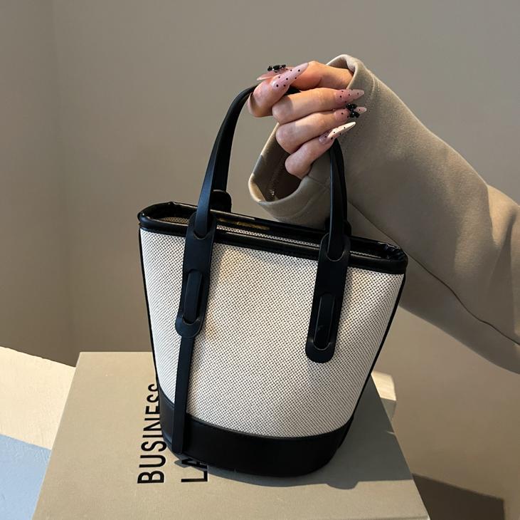 Bolsa de balde de color de contraste popular de este año 2026 nuevo bolso de hombro universal bolso de viaje simple de alta calidad
