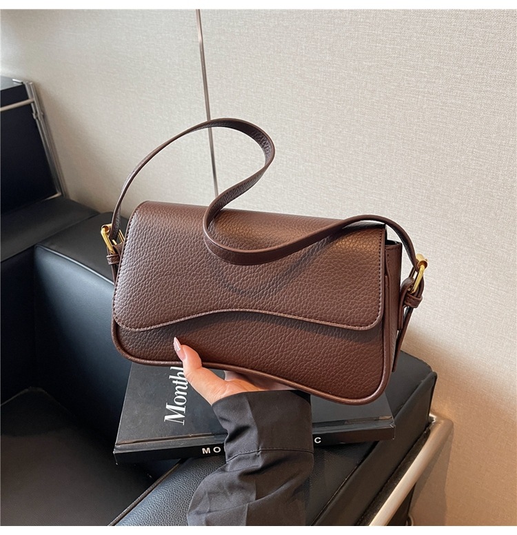 Bolso de hombro con hebilla magnética de nuevo estilo de alta calidad para viajar al trabajo, bolso de mujer simple de moda, bolso de axila, portátil diagonal