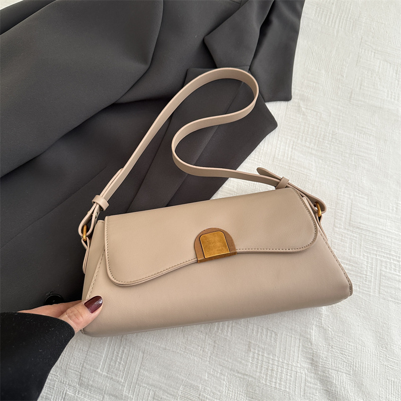 Bolso de brazo retro de palo para mujeres 2025 nuevo nicho de moda de alta sensación bolso de hombro universal bolso de mochila