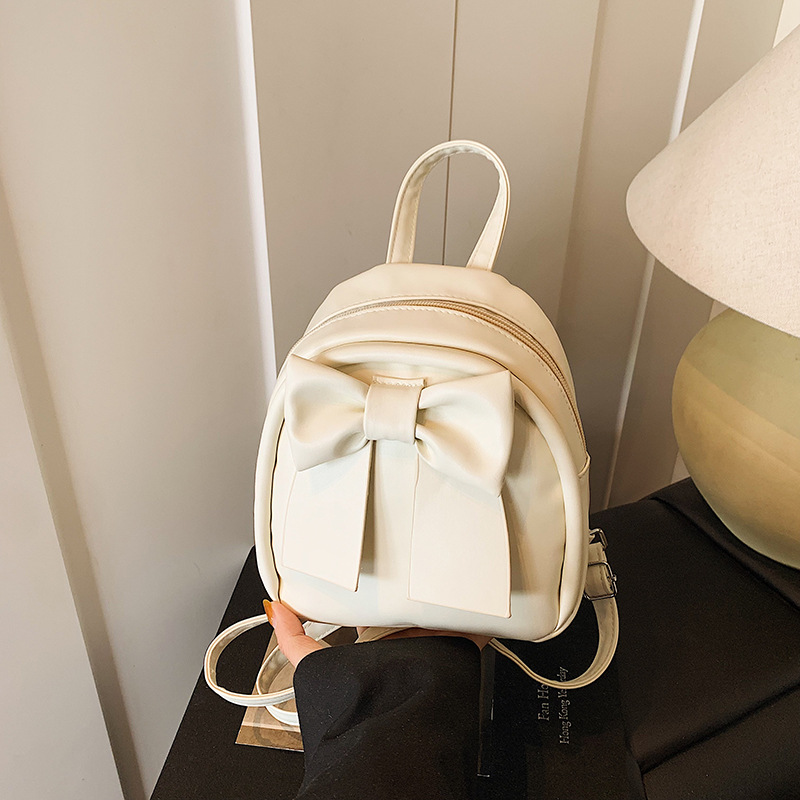 Lindo bolso pequeño con lazo simple 2025 verano nuevo estilo diseño sentido mochila pequeña moda estilo occidental mochila salvaje