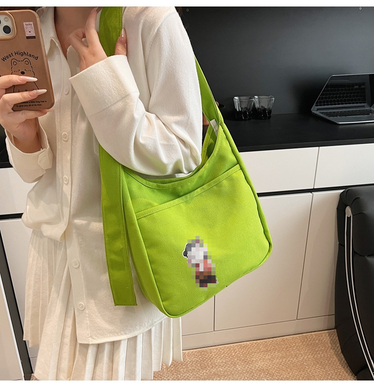 2025 nuevo bolso de lona bolso de hombro de gran capacidad para mujer bolso casual de todo fósforo para estudiantes en clase bolso de viaje