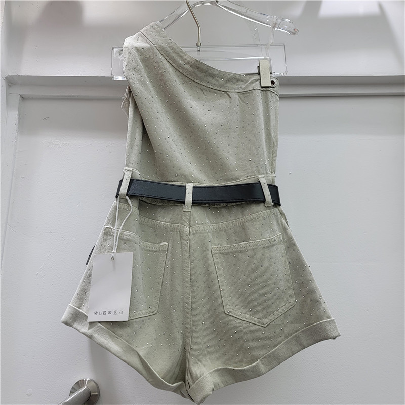 Irregular hombro inclinado cuerpo completo taladro jeans jeans mujeres 2026 verano nuevo diseño sensación de pantalones de pierna ancha pantalones calientes