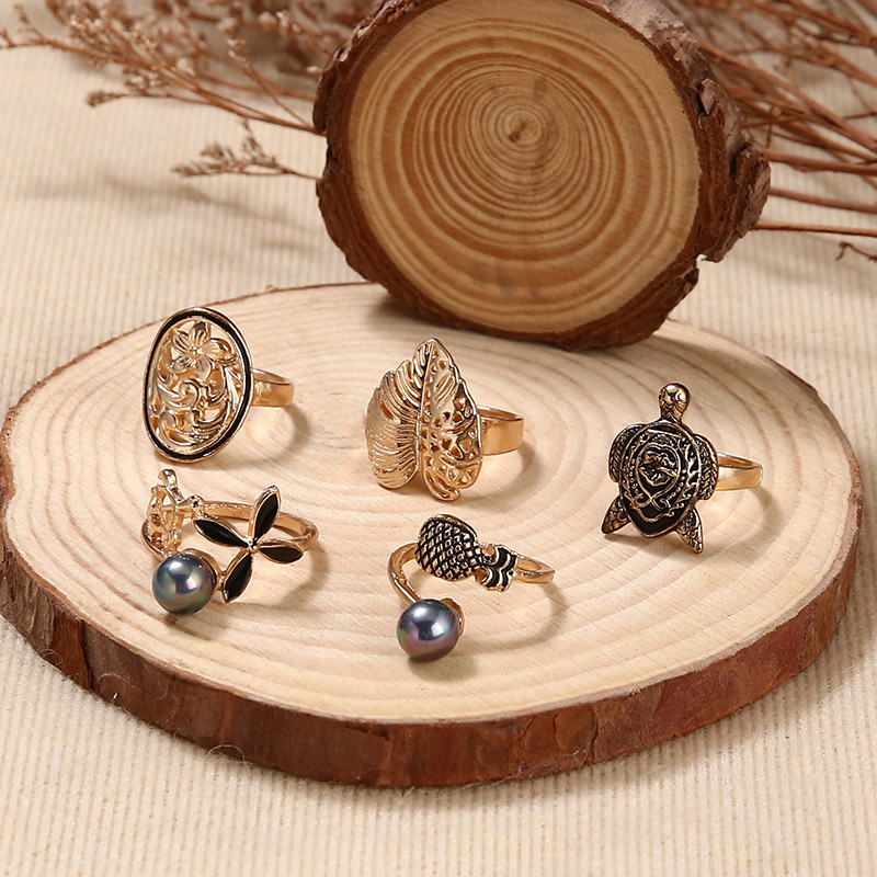 Cross-border Ring Set Fashion Colorful Gray Pearl Hollow Carved Leaves Tortoise Ring 5-piece Set display picture 3