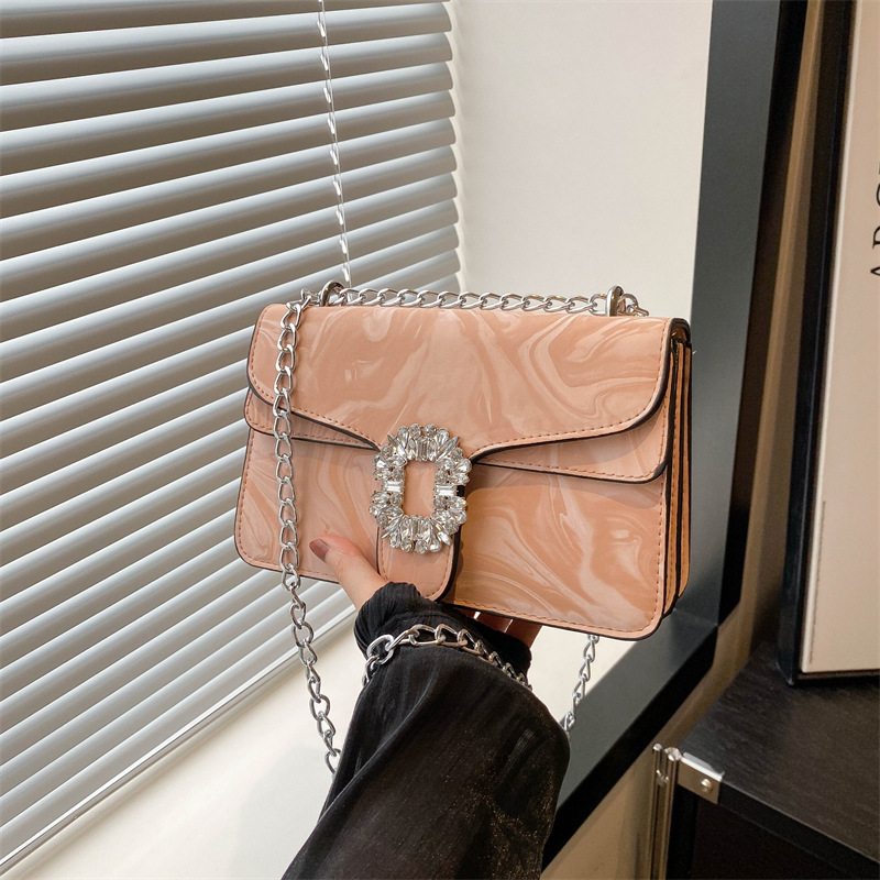 Moda simple temperamento coreano cadena de hombro bolso de mochila para mujeres 2024 primavera nueva bolsa de diamantes de estilo extranjero