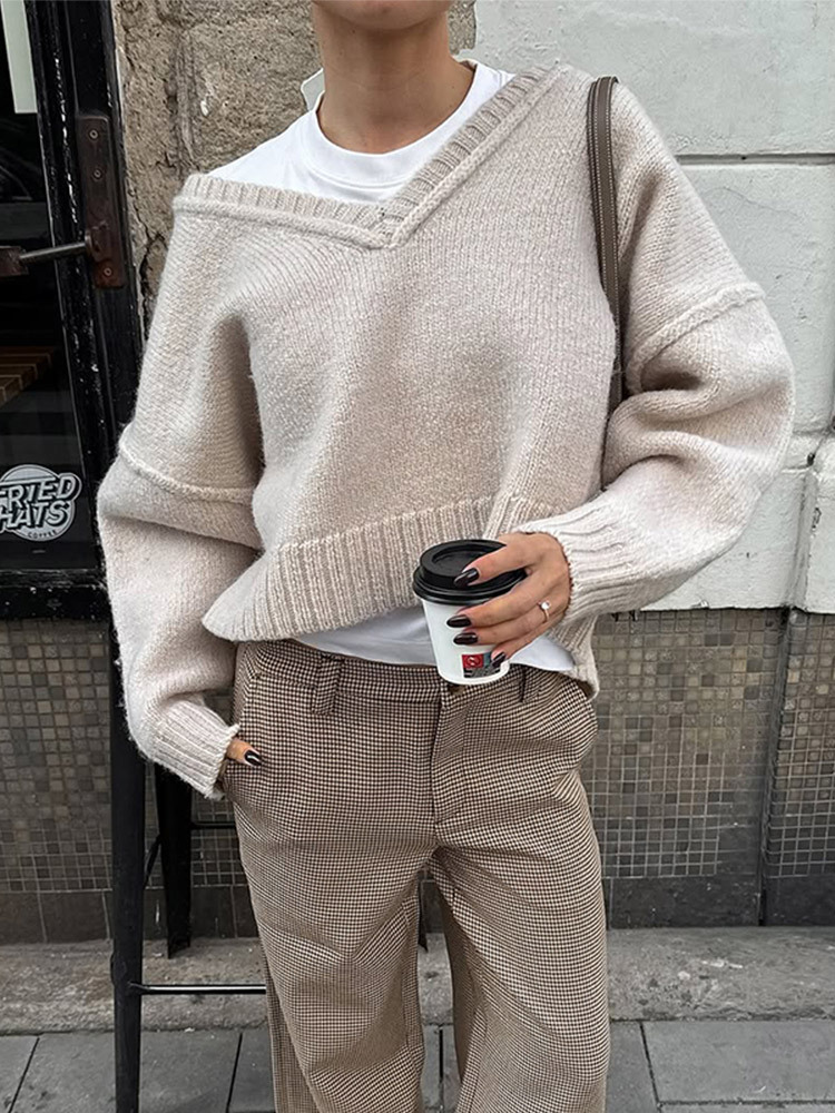 Temperamento de moda universal suelto color sólido cuello en V suéter de manga corta 2025, otoño y invierno nuevo estilo transfronterizo europeo y americano