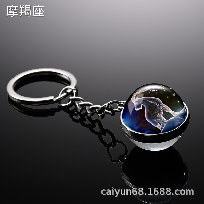 Transfronterizo 12 constelaciones de luz nocturna bolsos colgantes de bolsas de joyas de tiempo doble cara bola de vidrio llavero al por mayor