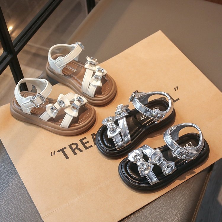 Zapatos de princesa para niñas 2025 verano nuevo estilo romano para niños con suela suave sandalias de moda de diamante
