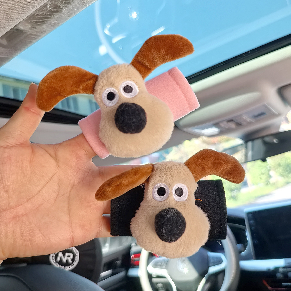 Perro de peluche maneja de automóvil maneja de automóvil masculino y femenino maneja de puerta interior cubierta guante de techo