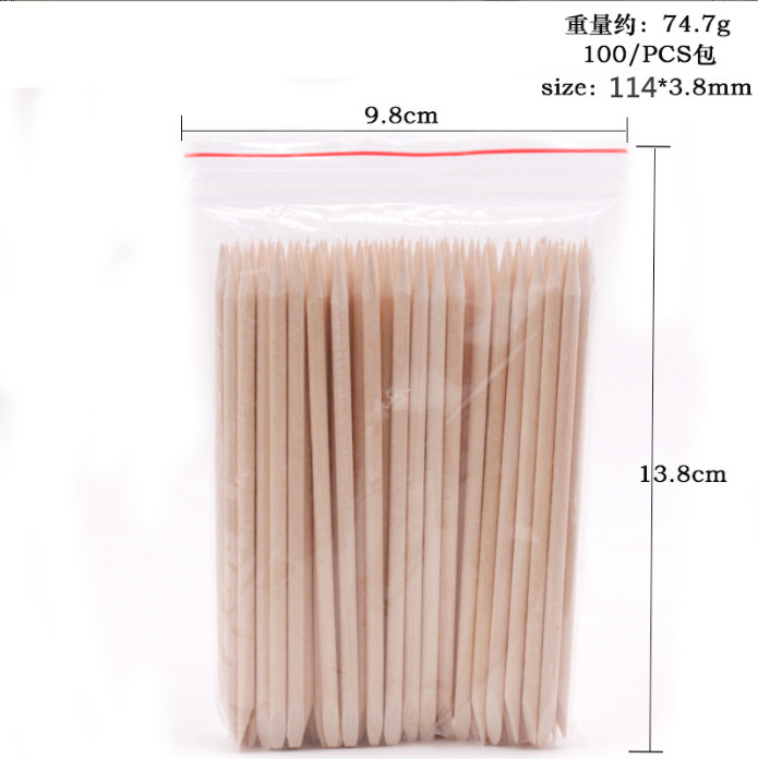 Herramientas de uñas al por mayor palo de naranja palo de madera piel muerta empuje 11,4 cm de doble cabeza de naranja palo 100 embolsado taladro palo