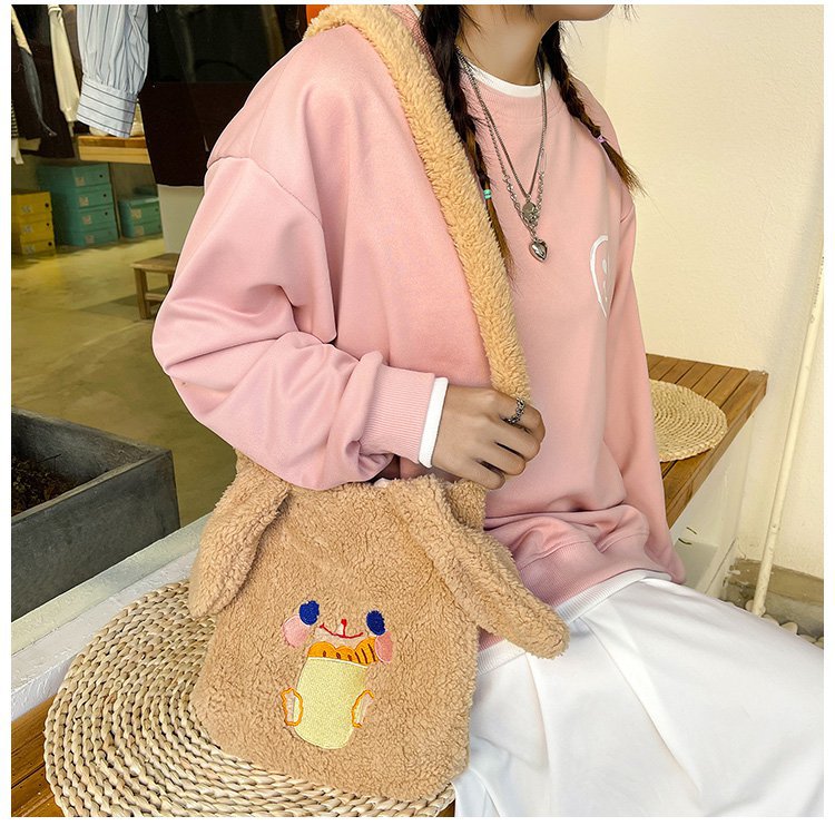 This autumn and winter hand-held bag with big ears, cute animal-embroidered fur, and a simple lambskin large-capacity student backpack undefined