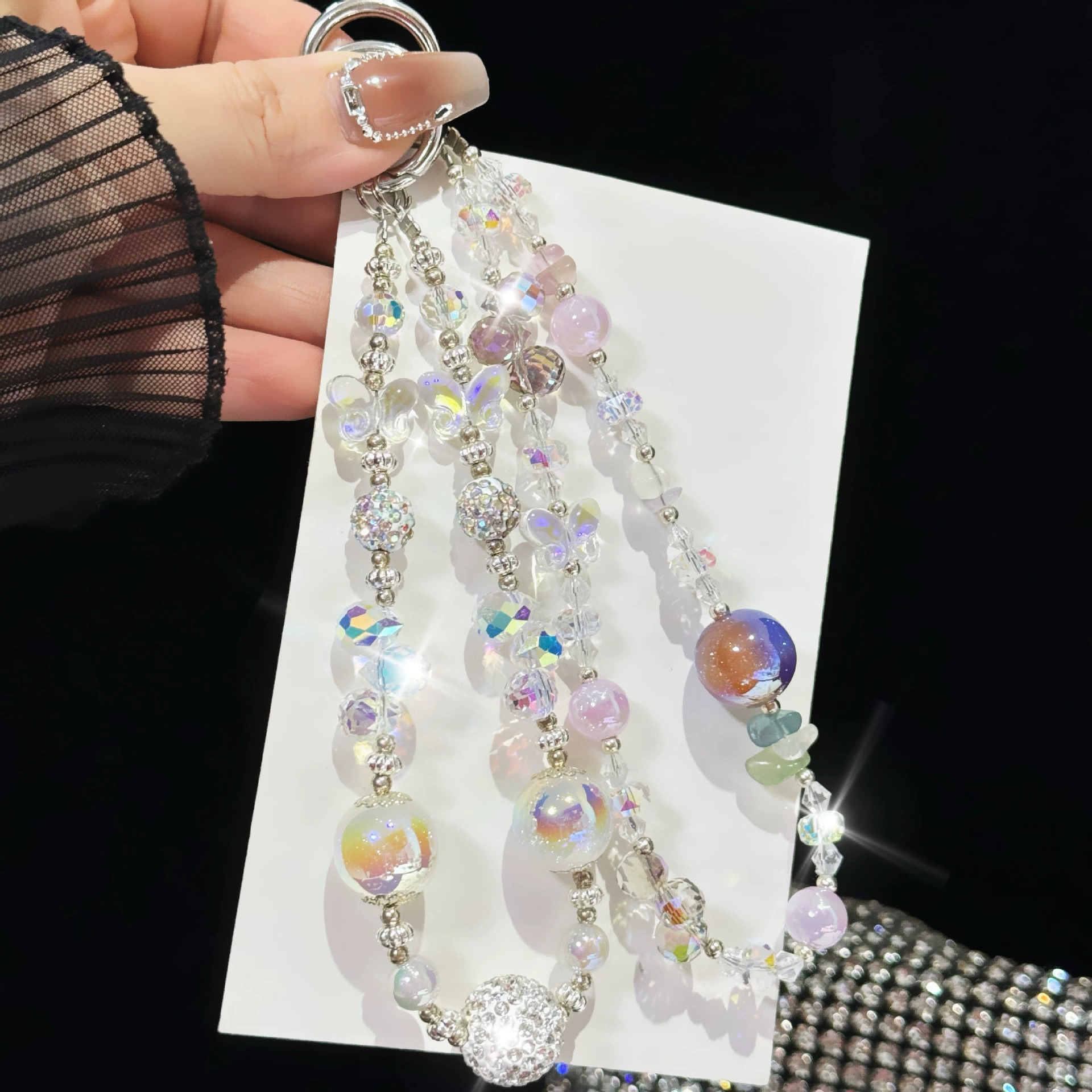 Sophisticated mobile phone, strap, short beaded bracelet, keychain