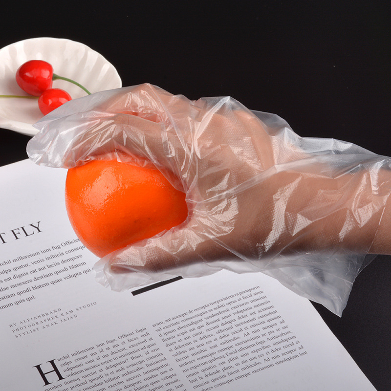 Disposable plastic transparent gloves