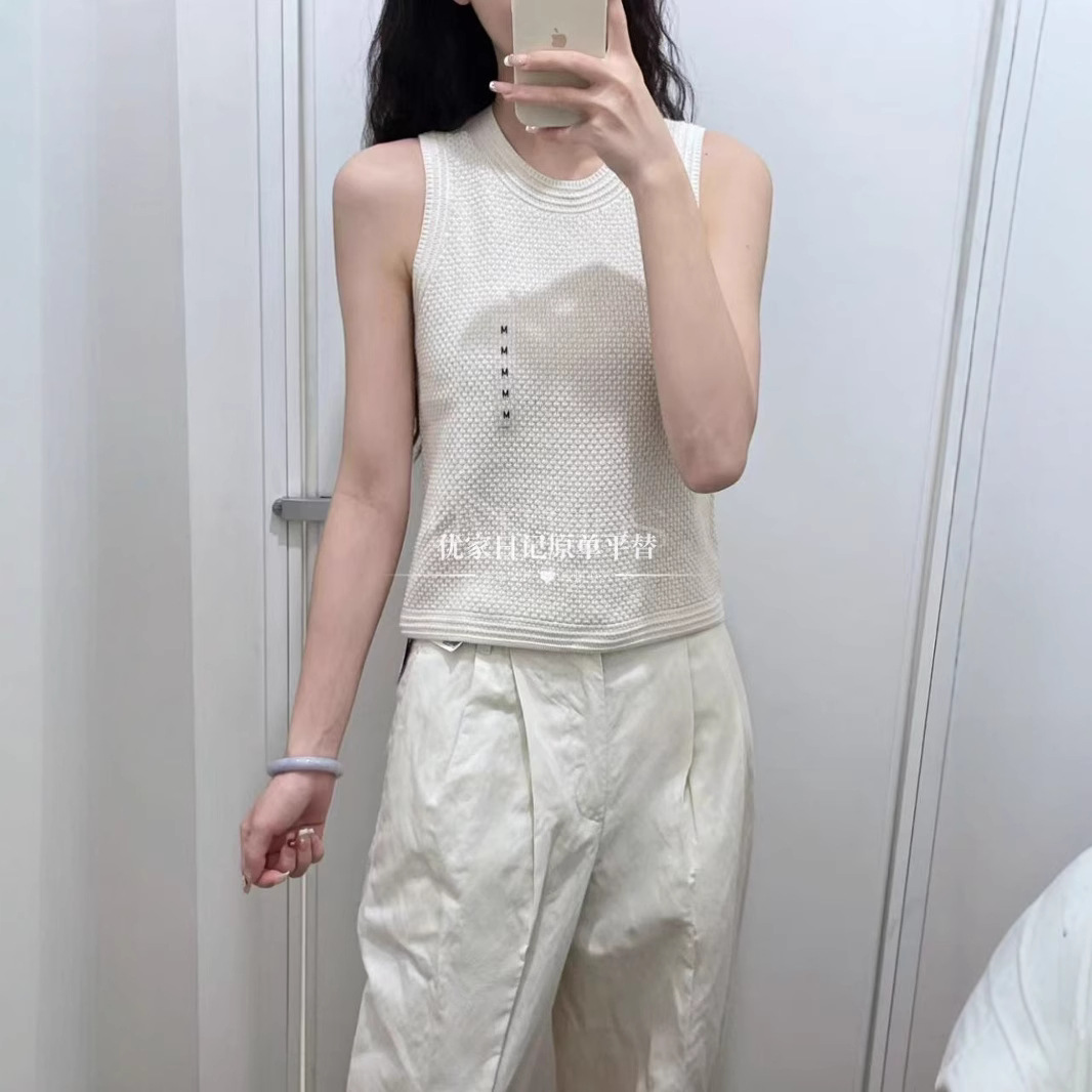 Summer knitted vest with a round collar