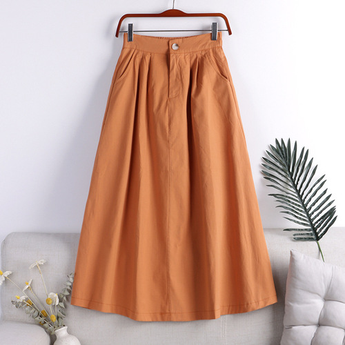 2021 new autumn solid color large swing literary Hong Kong style button pocket a-line skirt mid-length skirt for women