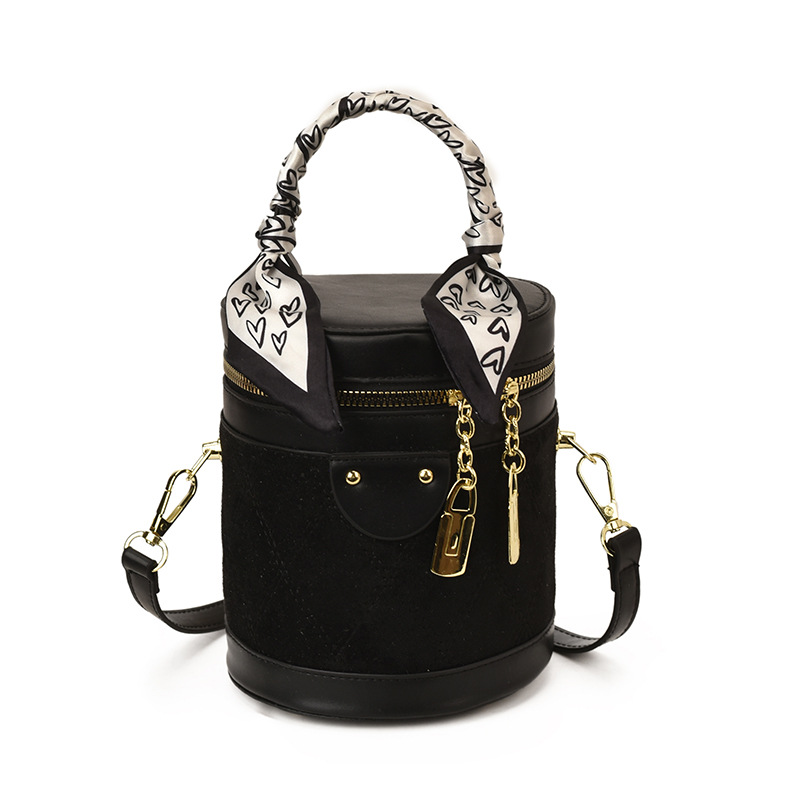 Bolso de hombro retro versátil para mujeres 2025 invierno nuevo nicho zhong mochila texturizado diamante bolso de cubo de mano