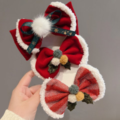 赤い大きな蝶結びの毛玉の髪飾りクリスマス装飾品のヘアピン王女の女の子の赤ちゃんのクリスマスの髪飾り