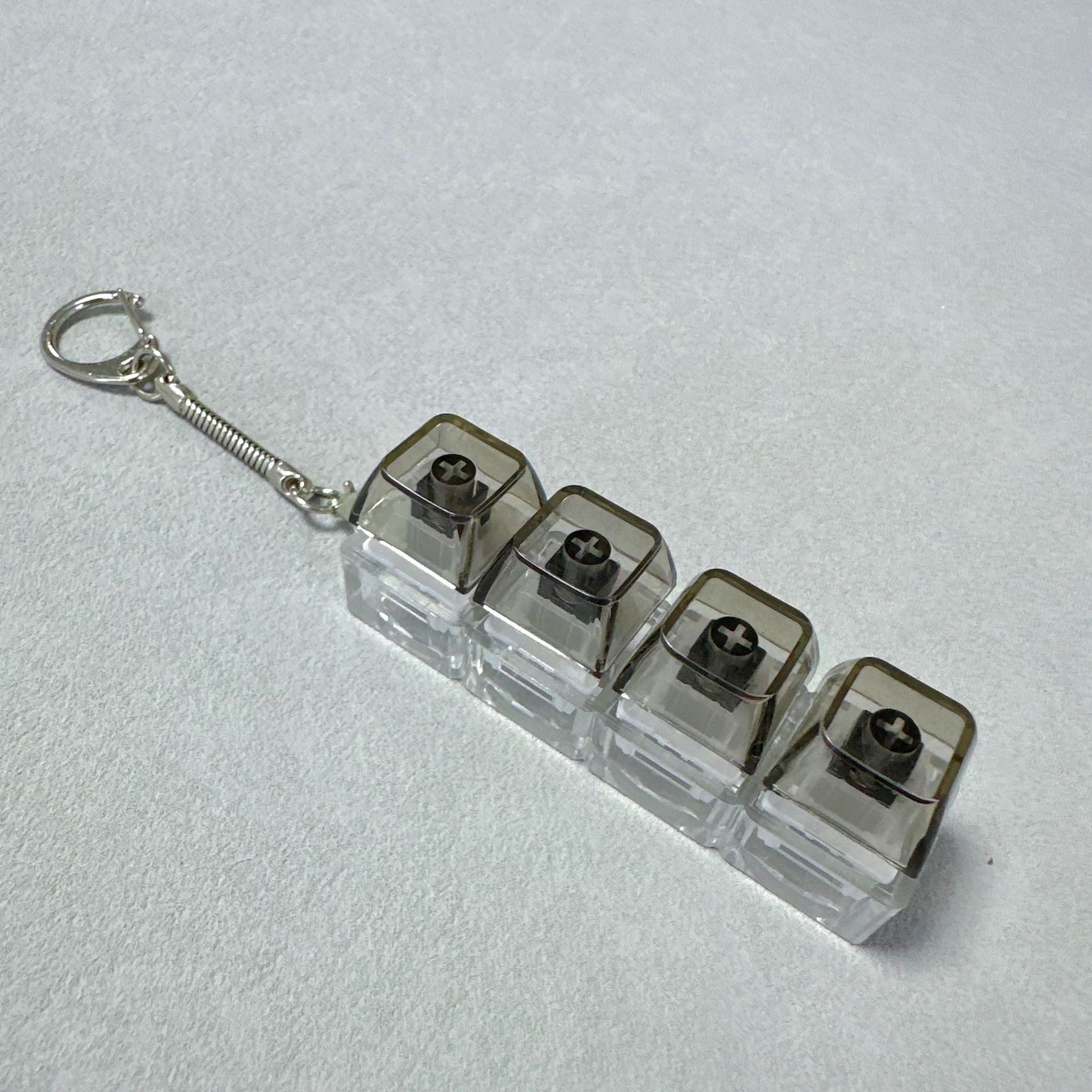Four-key transparent shell-pc black transparent cap (black and white shaft silent)